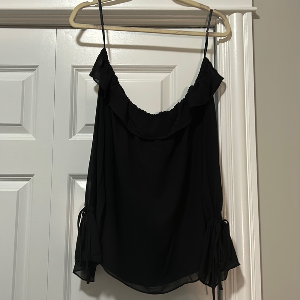 Never worn! Black Naked Zebra off the shoulder ruffle blouse